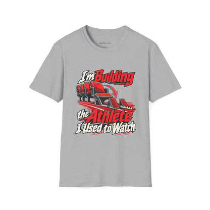 Graphic fitness T-shirt featuring the "I'm Building the Athlete I Used to Watch" design.