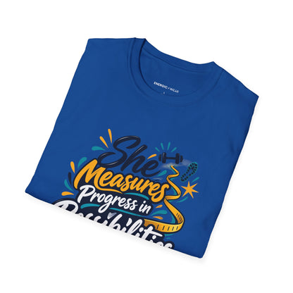 Graphic fitness T-shirt featuring the "She Measures Progress in Possibilities" design.