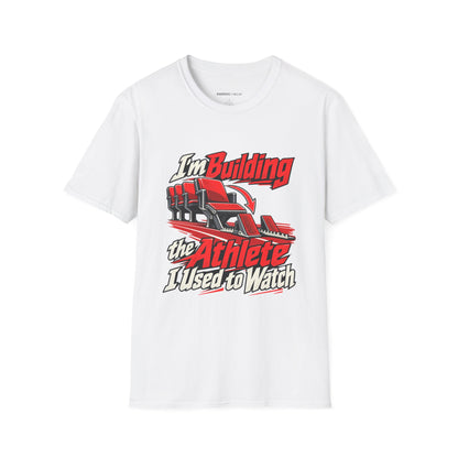 Graphic fitness T-shirt featuring the "I'm Building the Athlete I Used to Watch" design.
