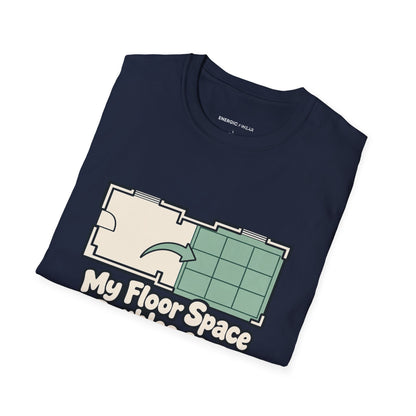 Graphic fitness T-shirt featuring the "My Floor Space Doubles as a Movement Studio" design.