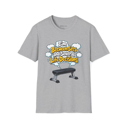 Graphic fitness T-shirt featuring the "I'm Between Sets and Several Life Decisions" design.