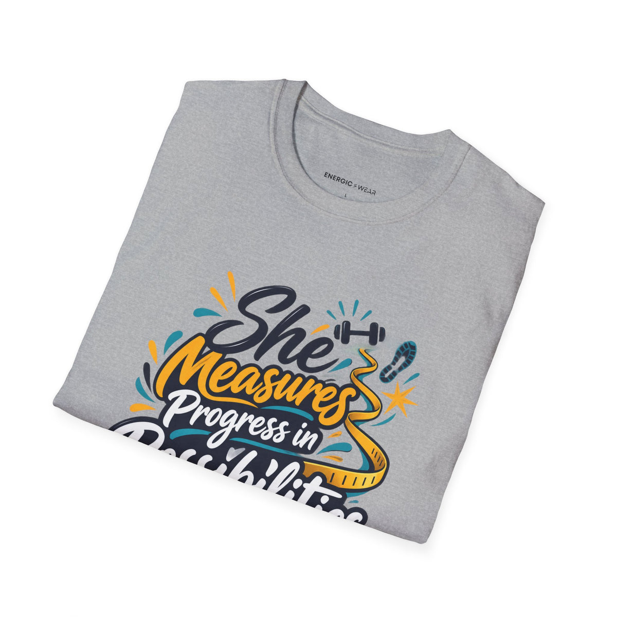 Graphic fitness T-shirt featuring the "She Measures Progress in Possibilities" design.