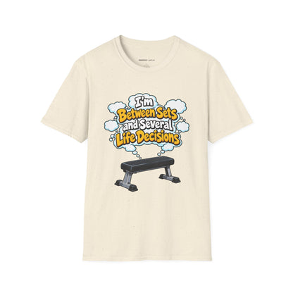 Graphic fitness T-shirt featuring the "I'm Between Sets and Several Life Decisions" design.
