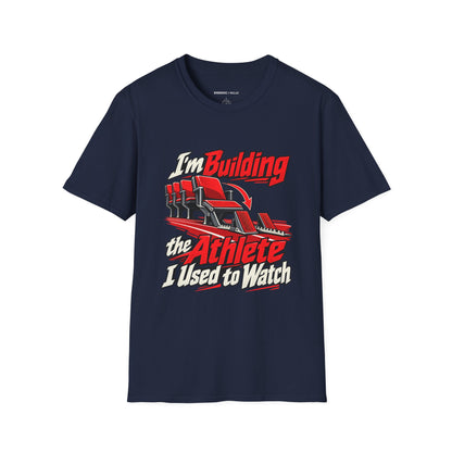 Graphic fitness T-shirt featuring the "I'm Building the Athlete I Used to Watch" design.