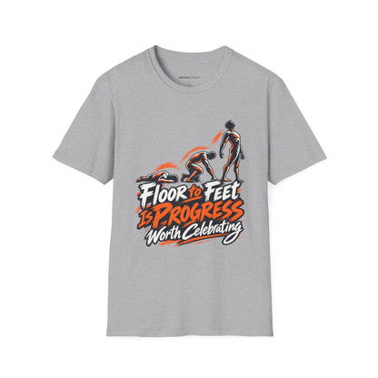 Graphic fitness T-shirt featuring the "Floor to Feet Is Progress Worth Celebrating" design.