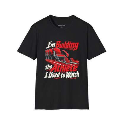 Graphic fitness T-shirt featuring the "I'm Building the Athlete I Used to Watch" design.