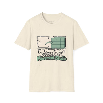 Graphic fitness T-shirt featuring the "My Floor Space Doubles as a Movement Studio" design.
