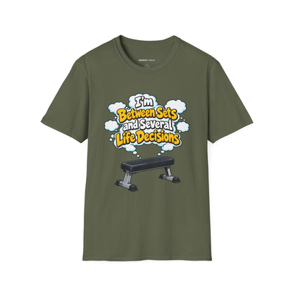 Graphic fitness T-shirt featuring the "I'm Between Sets and Several Life Decisions" design.