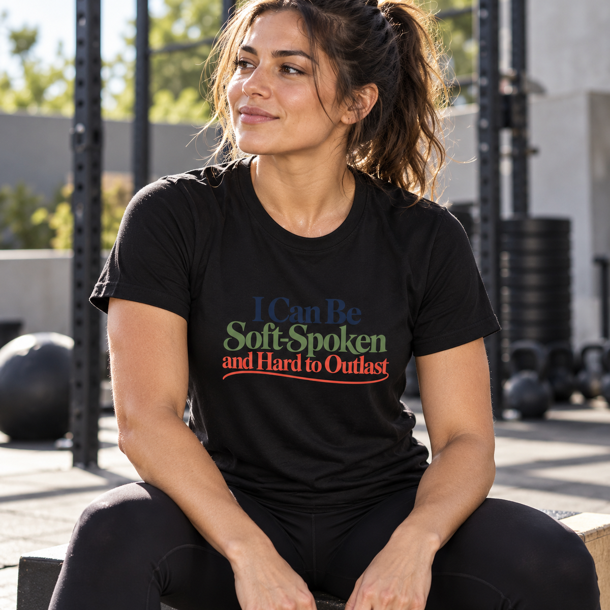 Female lifestyle mockup — I Can Be Soft-Spoken and Hard to Outlast T-Shirt