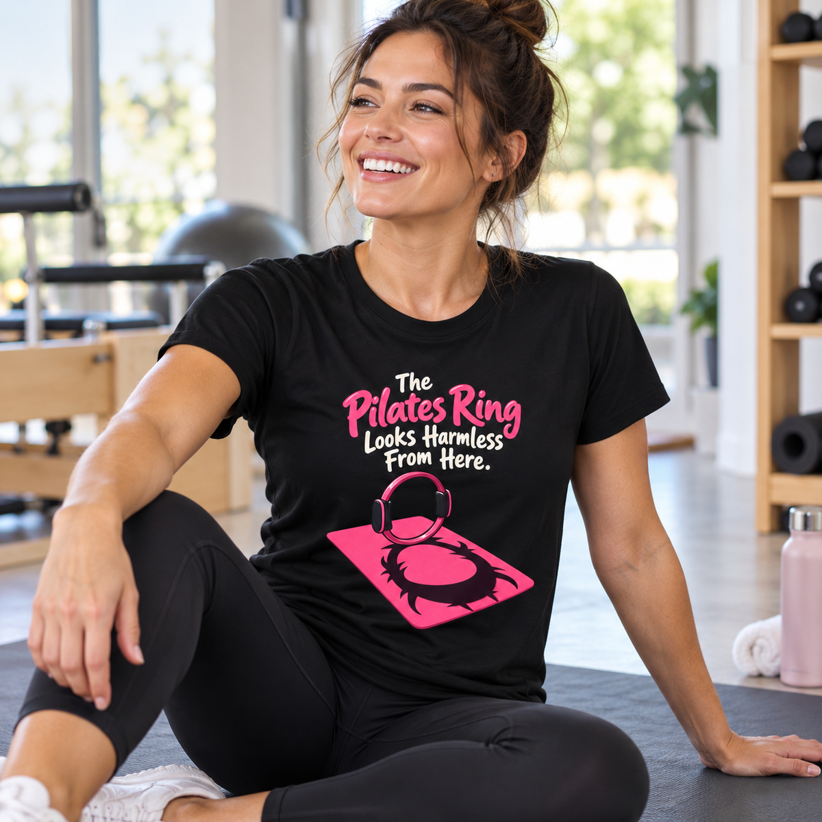Female lifestyle mockup — The Pilates Ring Looks Harmless From Here T-Shirt
