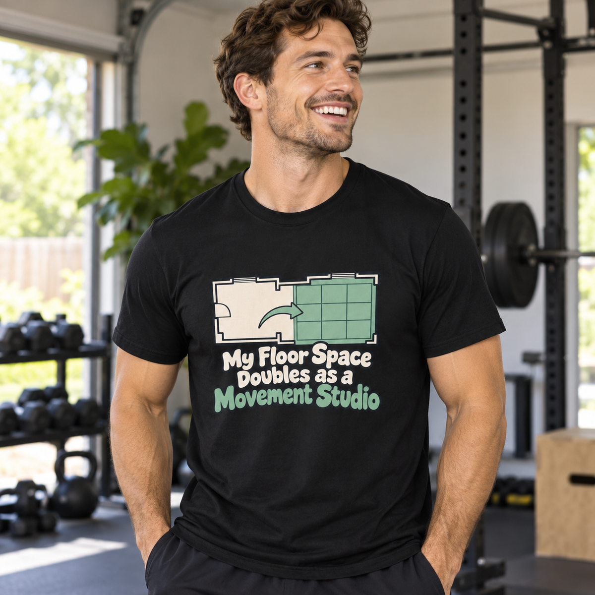 Male lifestyle mockup — My Floor Space Doubles as a Movement Studio T-Shirt