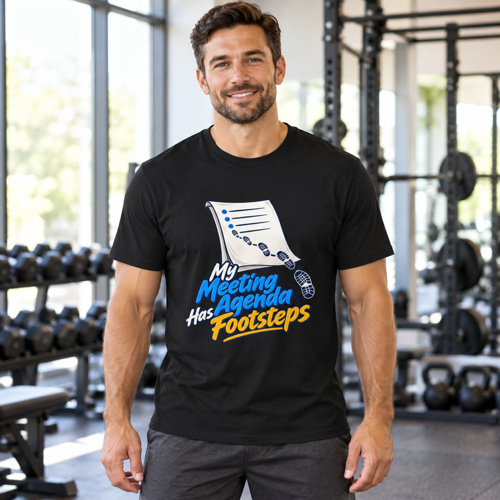 Male lifestyle mockup — My Meeting Agenda Has Footsteps T-Shirt